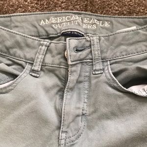 American Eagle light teal super stretch jeans